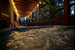 Relax after a day at Dollywood in the hot tub under the market lights.