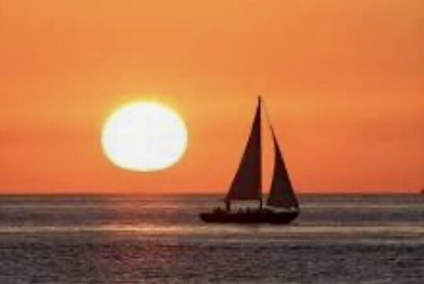 Sailboat at sunset on Boca Grande beach