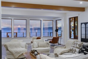 Expansive living room with several seating areas and that incredible view! 