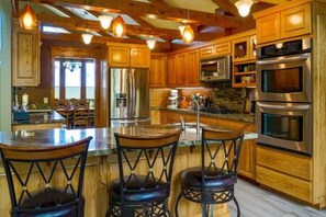 Kitchen island with bar stools