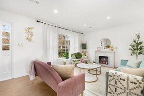 Warm and inviting living space with electric fireplace