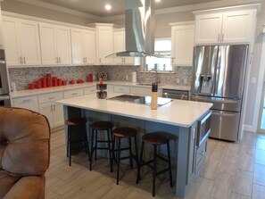 Kitchen looking from TV area.