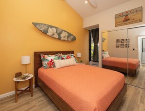 The "Papaya" BR w/ Queen bed, 100% cotton linens, whisper quiet AC, ceiling fan.