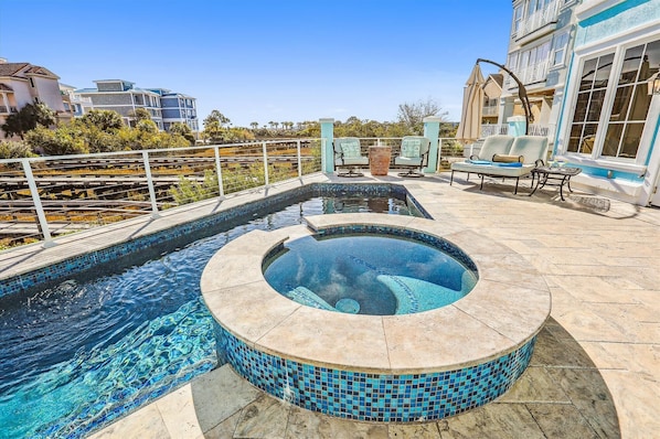 Relax on the serene deck with a private pool and spa, dine al fresco, and indulge in memorable complimentary activities with family and friends.