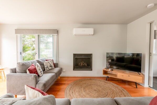 Spacious Lounge with Smart TV and Gas Fireplace