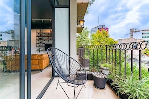 Outdoor seating on the private balcony