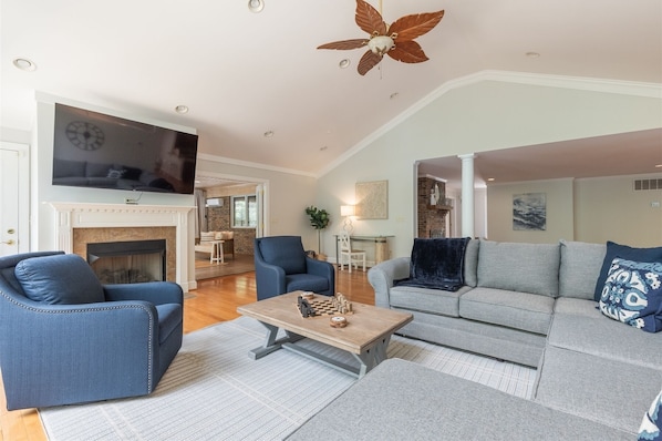 Upstairs living room with 75 inch TV.