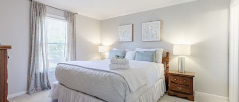 Master bedroom with a king bed.