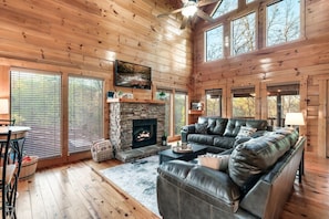 Beautiful leather couches and high ceiling living room / Great room