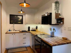 Lovely kitchen with oven, stove, microwave, mini-fridge, Keurig + coffee station
