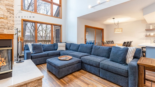 Relax in comfort with a cozy fire and a good movie