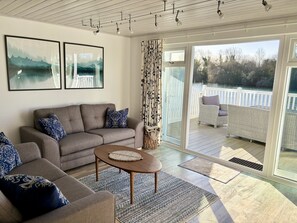 Comfortable living space leading to the south facing deck.