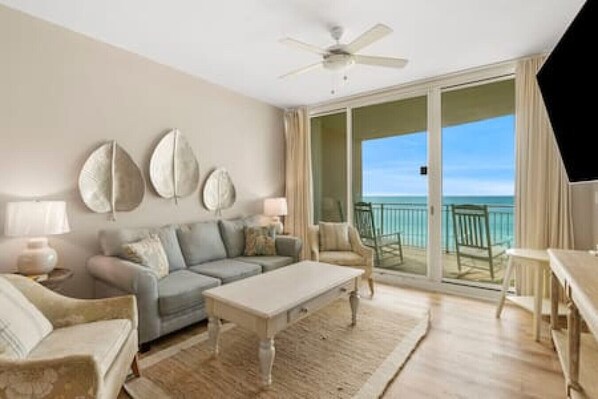 Beautifully decorated living room with private balcony and ocean views!