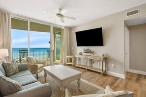 Living room with smart tv and private balcony