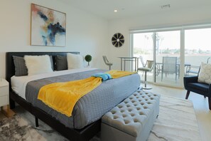 A sophisticated bedroom with custom-designed furniture