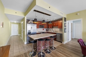 Fully Stocked Kitchen with Ocean Views and Island Bar Seating