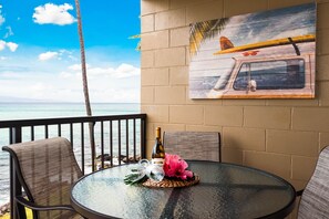 Dine al fresco listening to the waves crash