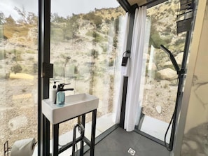 When you stay in one of our mirror homes at East Zion Resort, you will have your own, private, modern bathroom with shower. The mirrored glass provides privacy during the day and curtains provide the privacy at night.