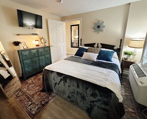 Smoky Hue ~ bedroom #1 w/ queen bed and ensuite bath