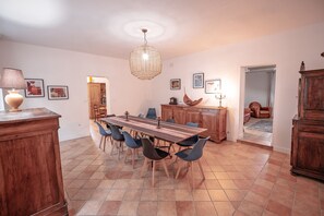 A large table that seats 15 comfortably.