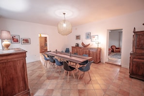 A large table that seats 15 comfortably.