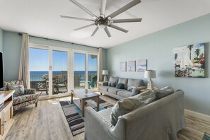 Living Area with Ocean Views, Flat Screen TV, Sleeper Sofa and Private Balcony Access