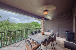 The porch has views of the stunning Comal River!