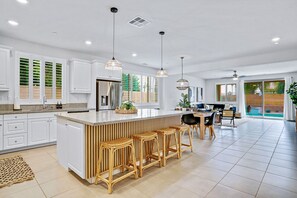 Huge open floor plan with modern fully stocked kitchen