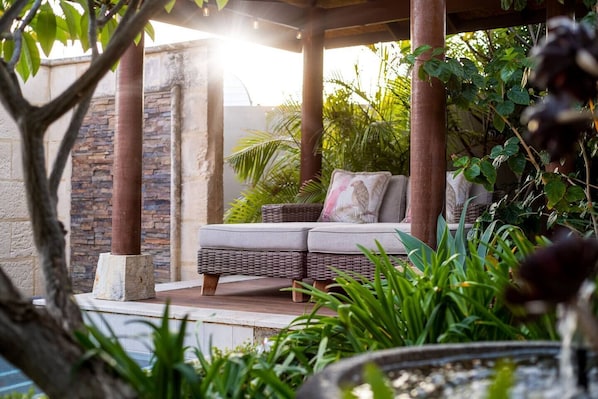 Relax by the pool with poolside seating / or sun lounges 