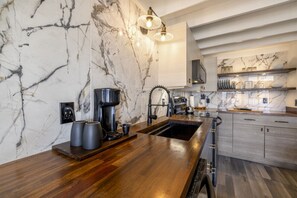 Open kitchen with high ceilings