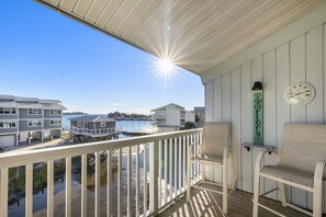 Private deck with view of the water and Dock St