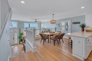 Dining area for 6 connected to the kitchen. Please note: there are a lot of stairs in the home and there are no safety gates.