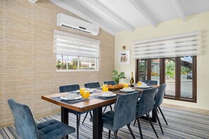 Gather around for memorable meals: Our dining area is a perfect blend of style and comfort, creating the ideal setting for shared moments.