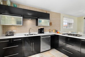 Our kitchen space is designed for both functionality and style, offering a delightful environment for your culinary adventures.