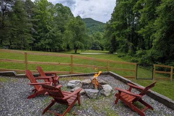 Fire pit area with a relaxing view - The perfect place to make new good memories with your family and friends.