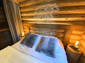 Bedroom with double bed and TV