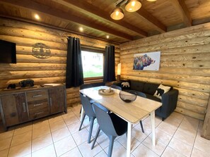 Living room with equipped kitchen