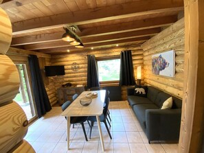 Living room with equipped kitchen