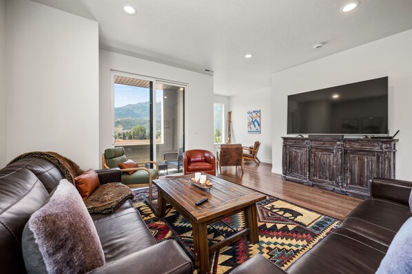 The living room has plenty of seating for you and your guests.