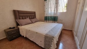 bed room,
extra pillows and sheet in the closet