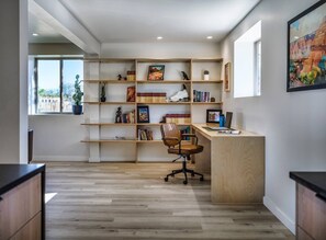 Work or unwind in our cozy nook, featuring a curated collection of antique Southwest-themed books and our top picks for outdoor adventure reads. It's the perfect blend of productivity and relaxation.