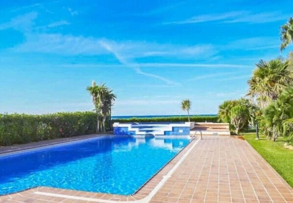 One of the community pools, right next to the beach.