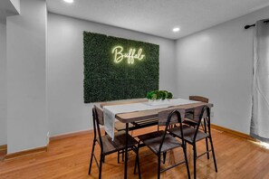 Dining Area with illuminated 'Buffalo' sign. Perfect for Instagram pics