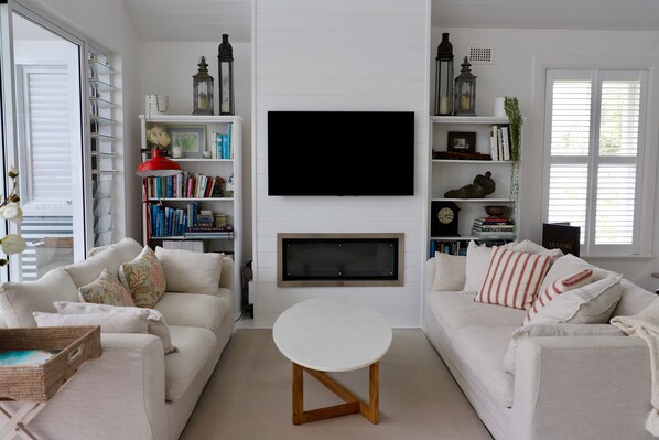 Comfortable living area opens to a large sunny north facing balcony