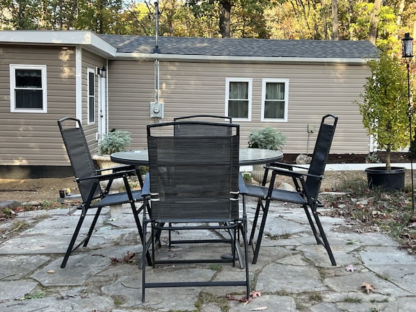 out door patio , with adjoining fire pit