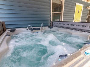 The bubbly Hot Tub is ideal for relaxing after a day at the beach.