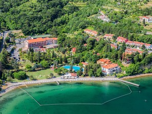 Water, Water Resources, Property, Building, Plant, Natural Landscape, Seaside Resort, Vegetation, Coastal And Oceanic Landforms, Tree