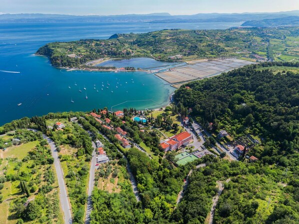 Water, Sky, Natural Landscape, Plant, Highland, Tree, Mountain, Urban Design, Coastal And Oceanic Landforms, Summer