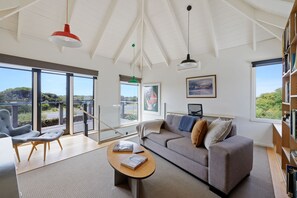 First floor lounge and decking . 55 inch smart  tv along with work station !