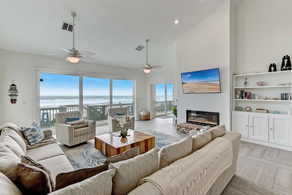 Main Living Area with Stunning Ocean Views, Sliding Balcony Doors, Smart TV and Fireplace